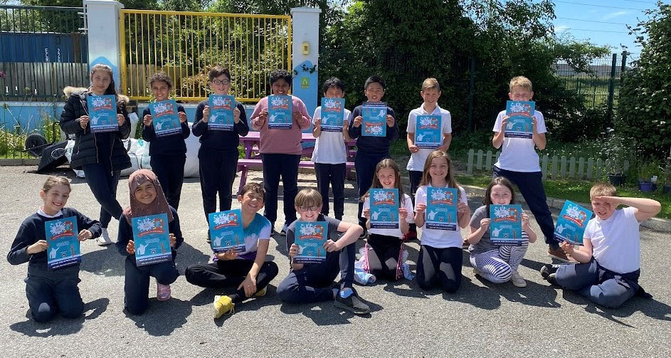 Children with certificates after the Paws Programme